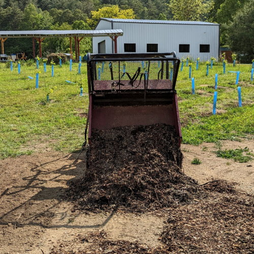 Spreading woodchips